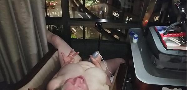  Naked and masturbating in front of the city at night